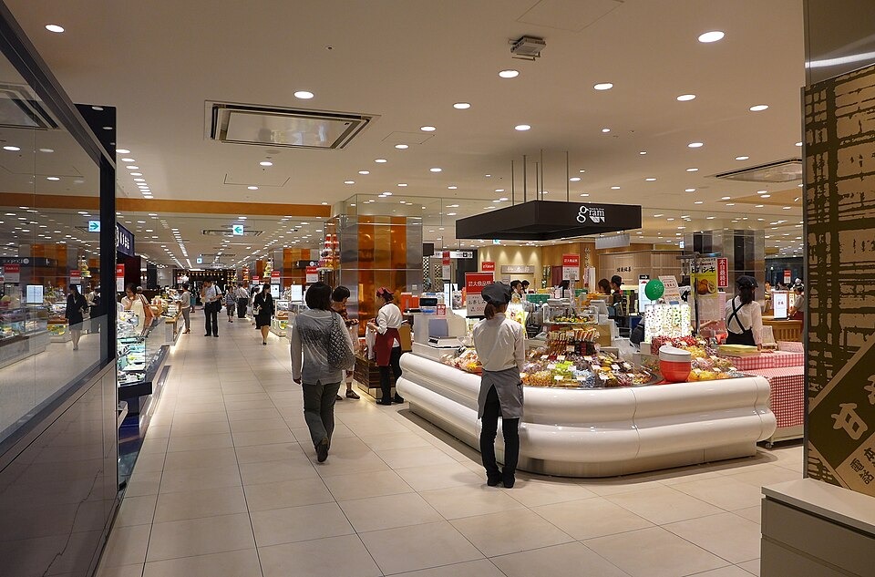 Shoppers and sweets counters inside the Kintetsu department store basement food hall