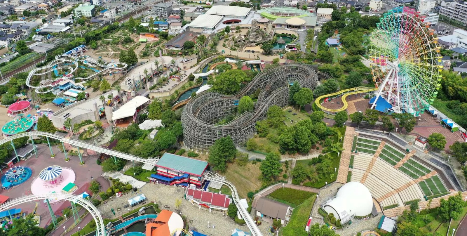 An elevated view across the rides and grounds of Hirakata Park