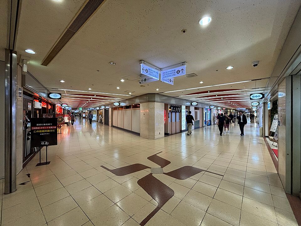 Restaurant signs lining the basement arcade of Osaka Ekimae Building No.4