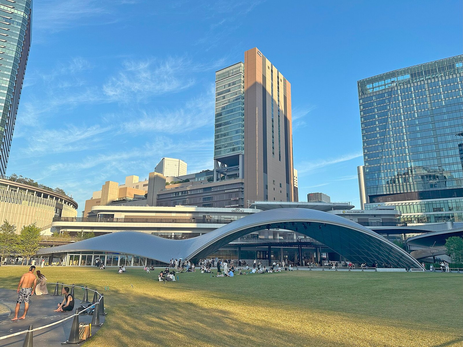Green lawns and modern buildings at Grand Green Osaka