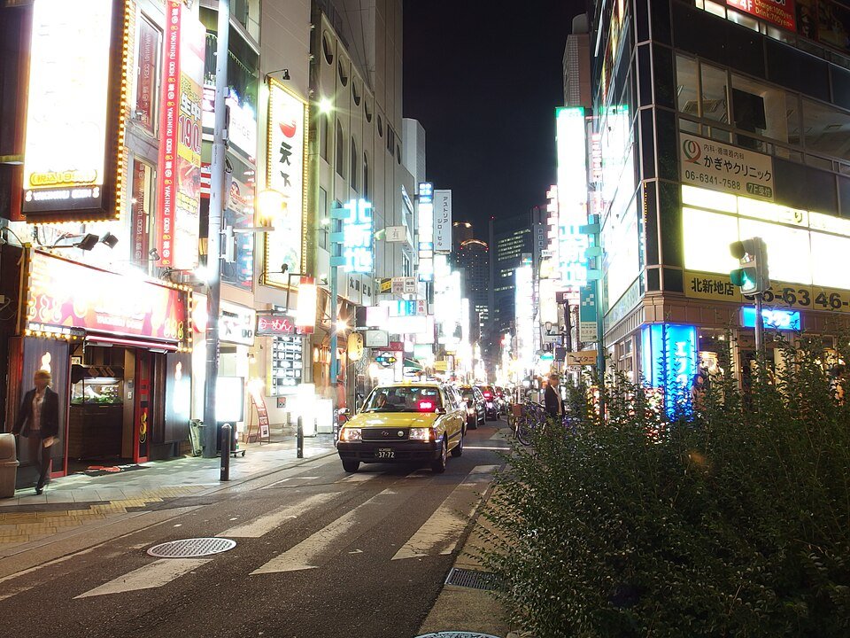 Illuminated signs along Kitashinchi streets at night