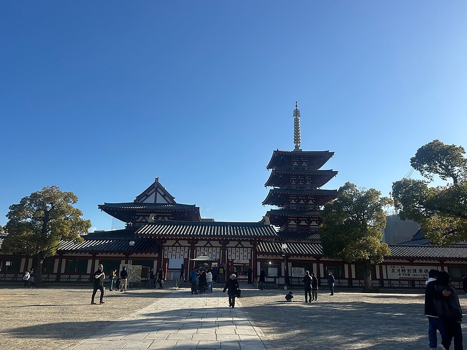 Shitennoji Temple halls and five-story pagoda beneath a clear blue sky